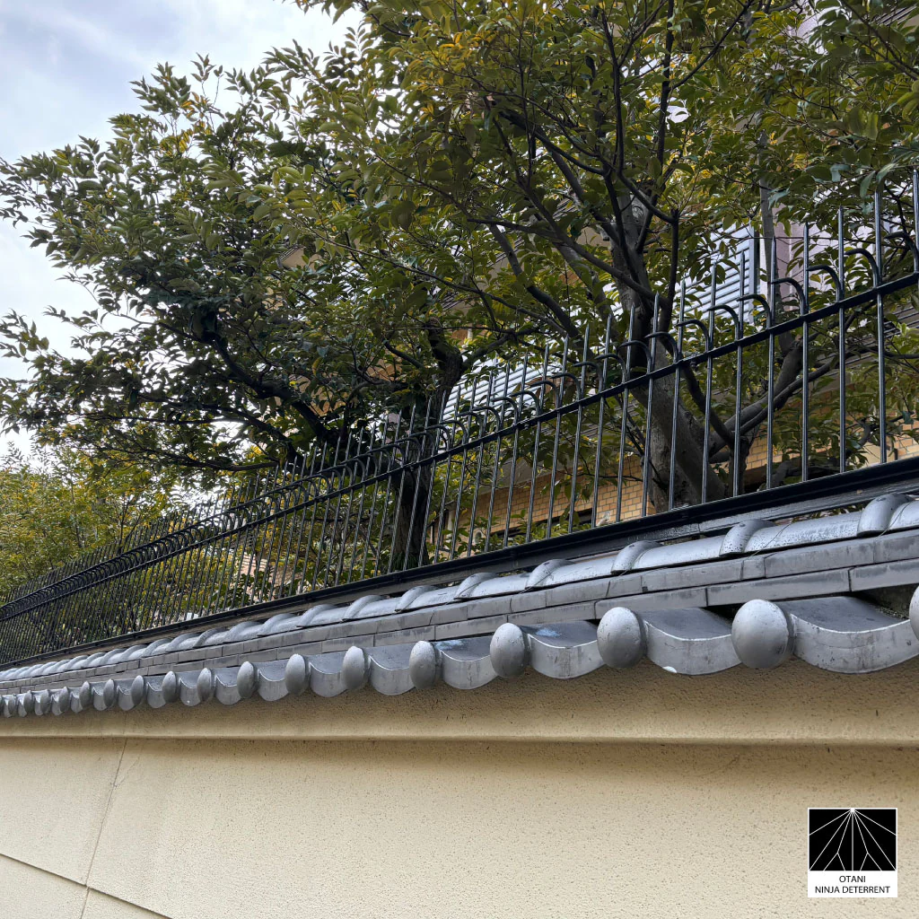 Modern ninja deterrent security spikes on Japanese wall