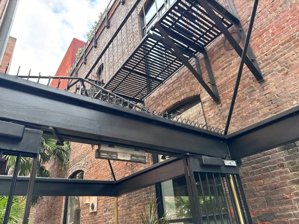 Relationship between the exterior fire escape and the Ninja Deterrent™ spike line.
