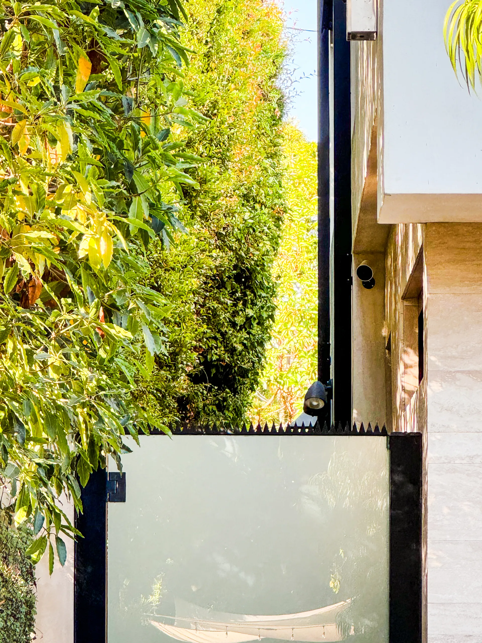 Entrance approach with concrete steps and the secured wall line