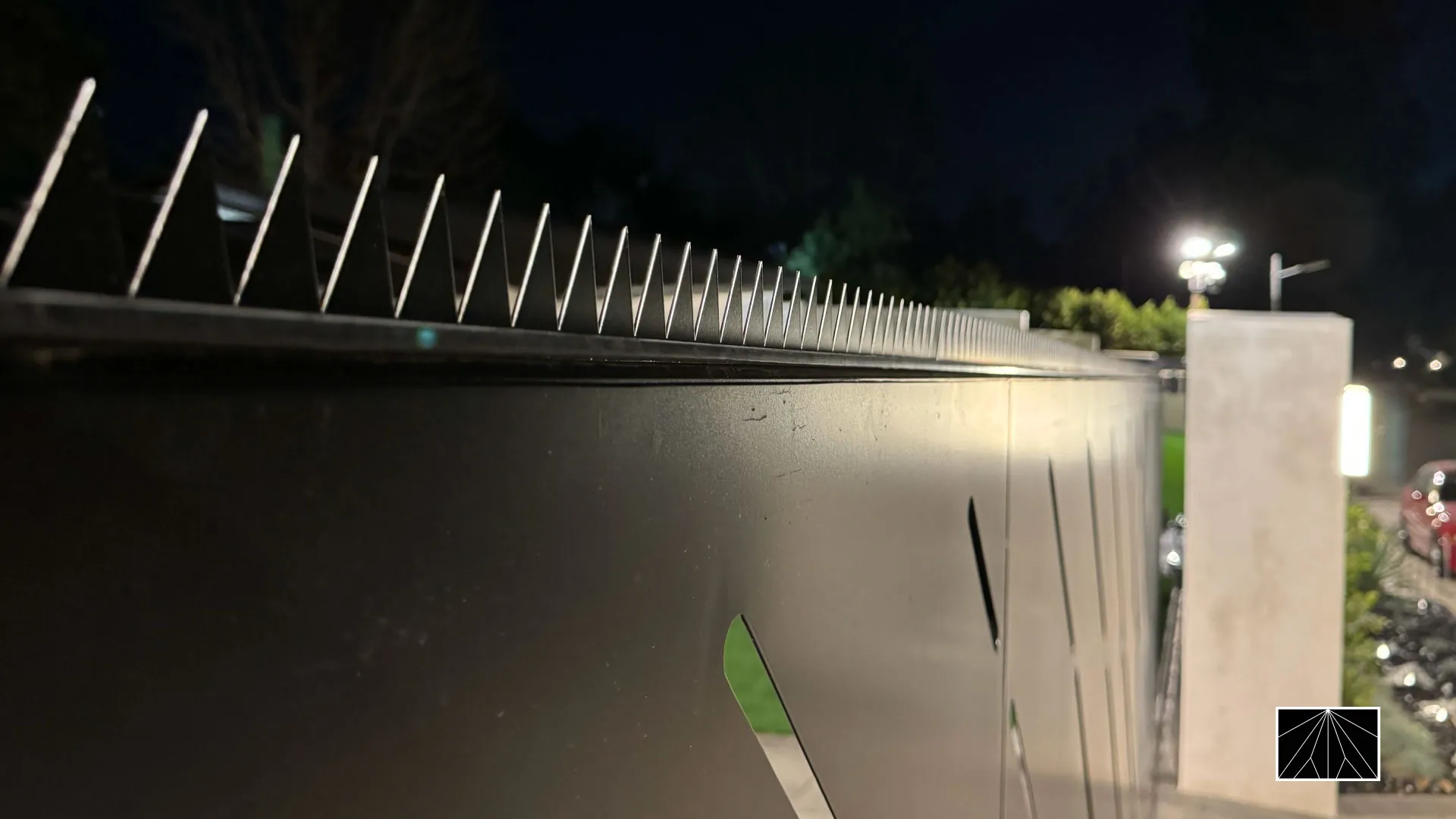 Bird spikes on a Japanese wall